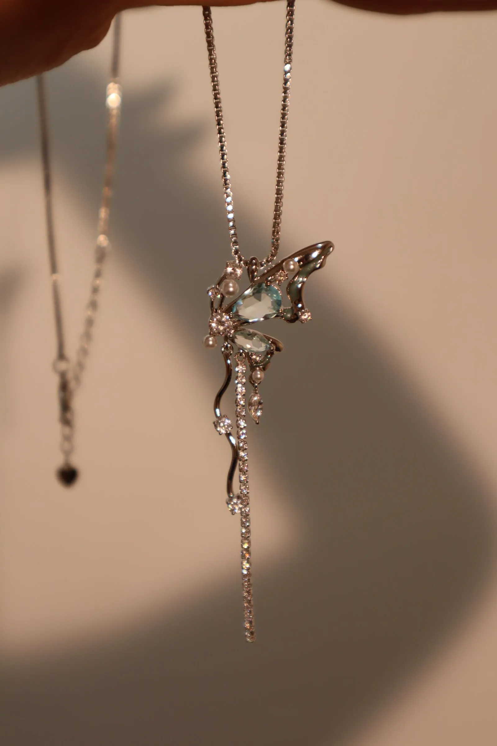 Platinum plated Blue Gem Butterfly Necklace